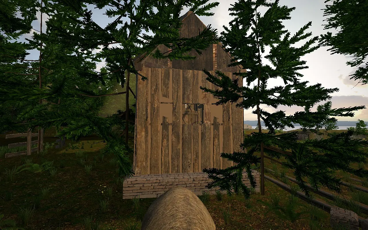 House Level 2 seen from the side, between the pines.