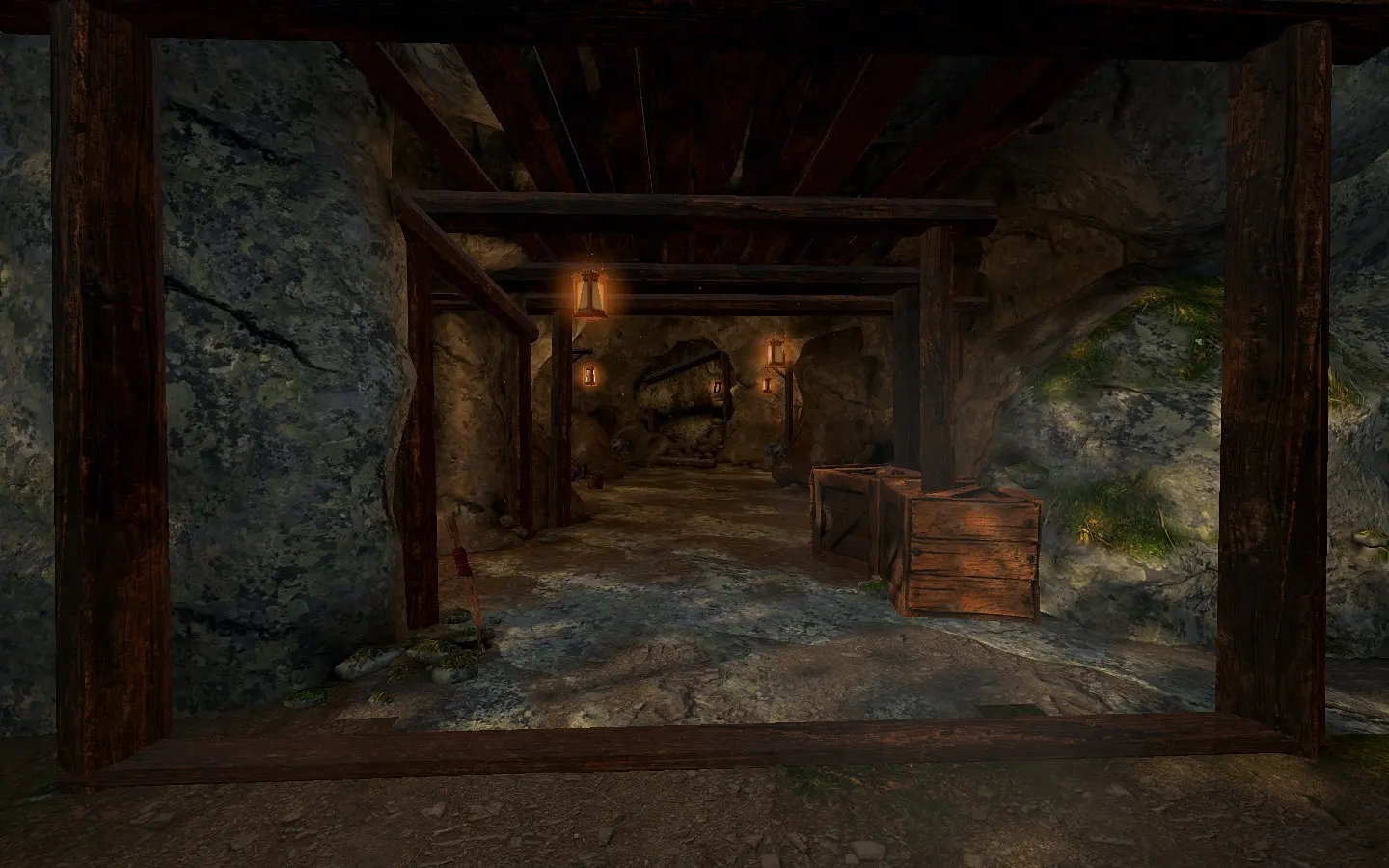 The timbered mouth of the mine set into the mountain.